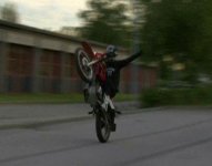 onehandedwheelie555.jpg