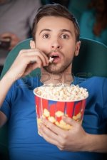 22817396-men-at-the-cinema-excited-young-men-watching-movie-at-the-cinema-and-eating-popcorn.jpg