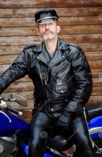 portrait-sexy-biker-dressed-black-leather-sitting-his-bike-sexy-biker-dressed-black-leather-si...jpg