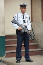 armed-mall-security-guard-in-the-philippines-v0-pi7ux2whmmsb1.jpg